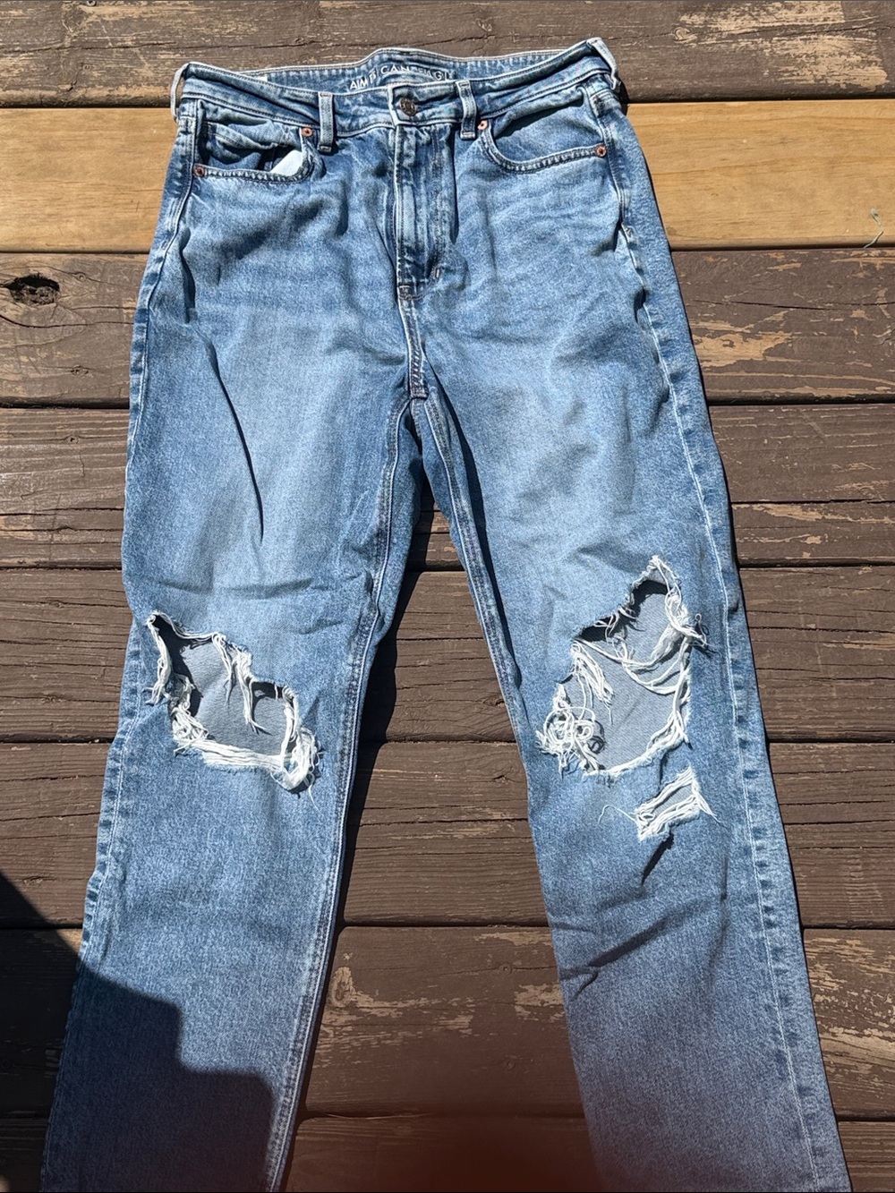 American Eagle Outfitters Light Blue Straight Jeans with Knee Rips